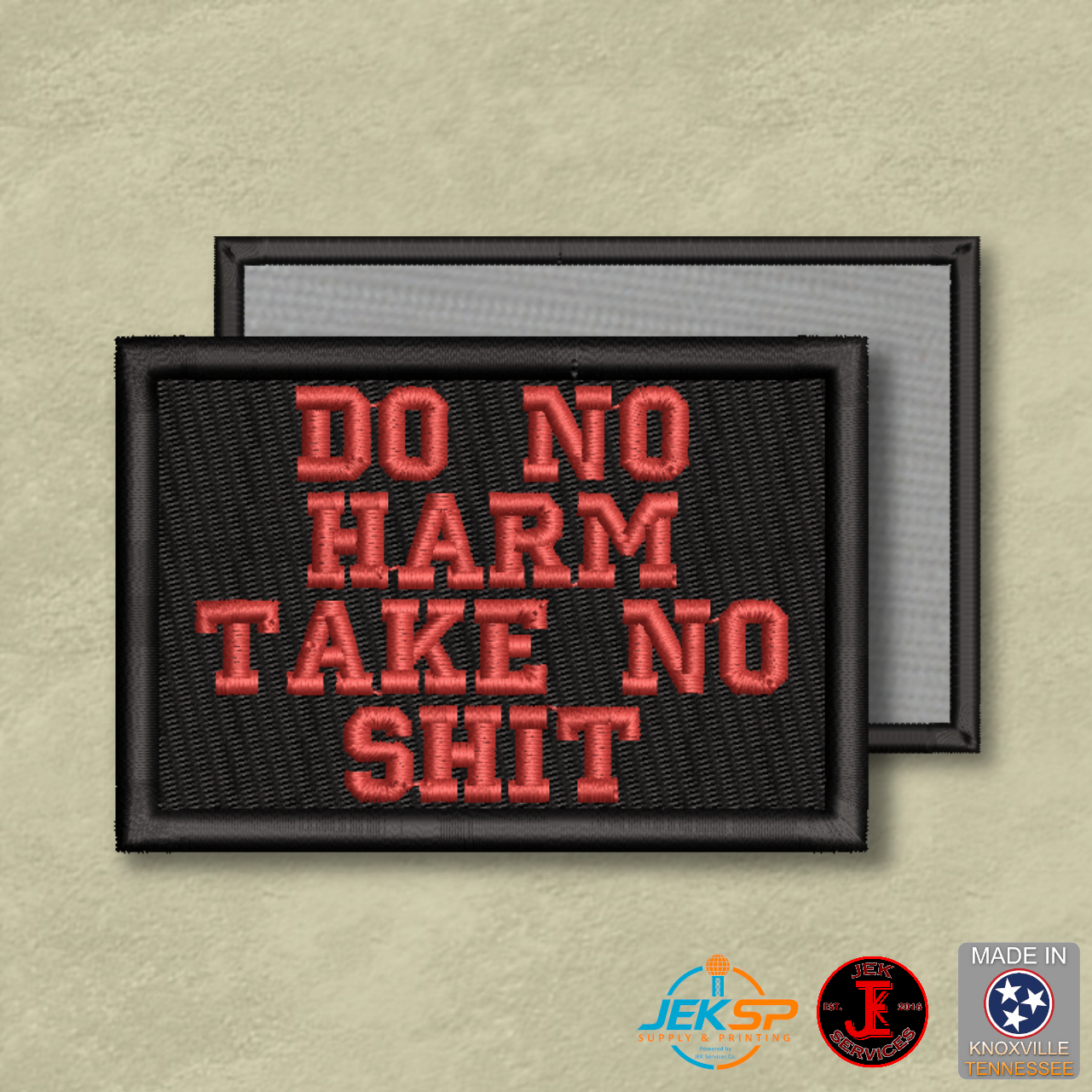 Black embroidered morale patch with red lettering reading "Do No Harm Take No Shit," featuring genuine VELCRO® hook backing and made in Tennessee.