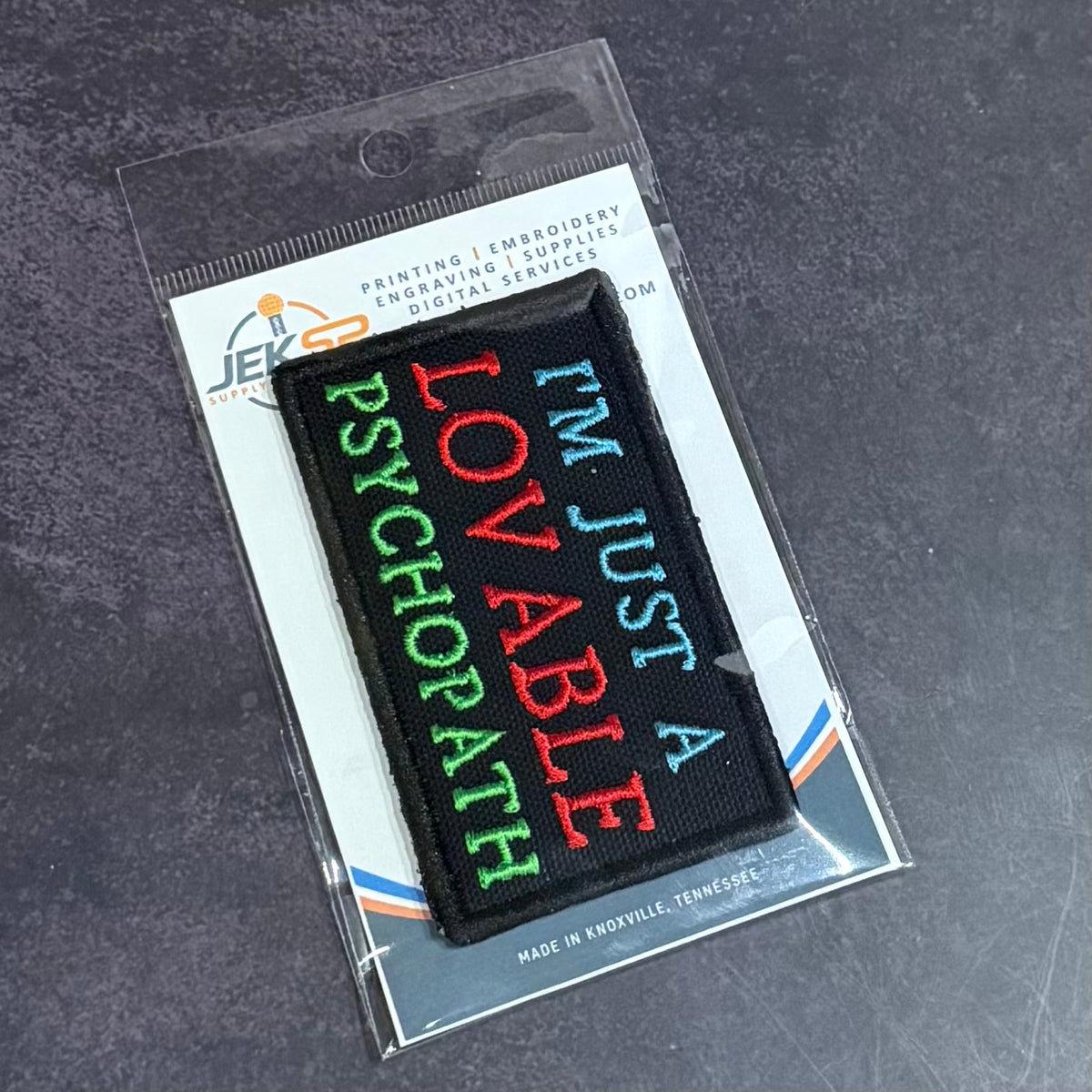 I'm Just A Lovable Psychopath Funny embroidered morale patch, product photograph.