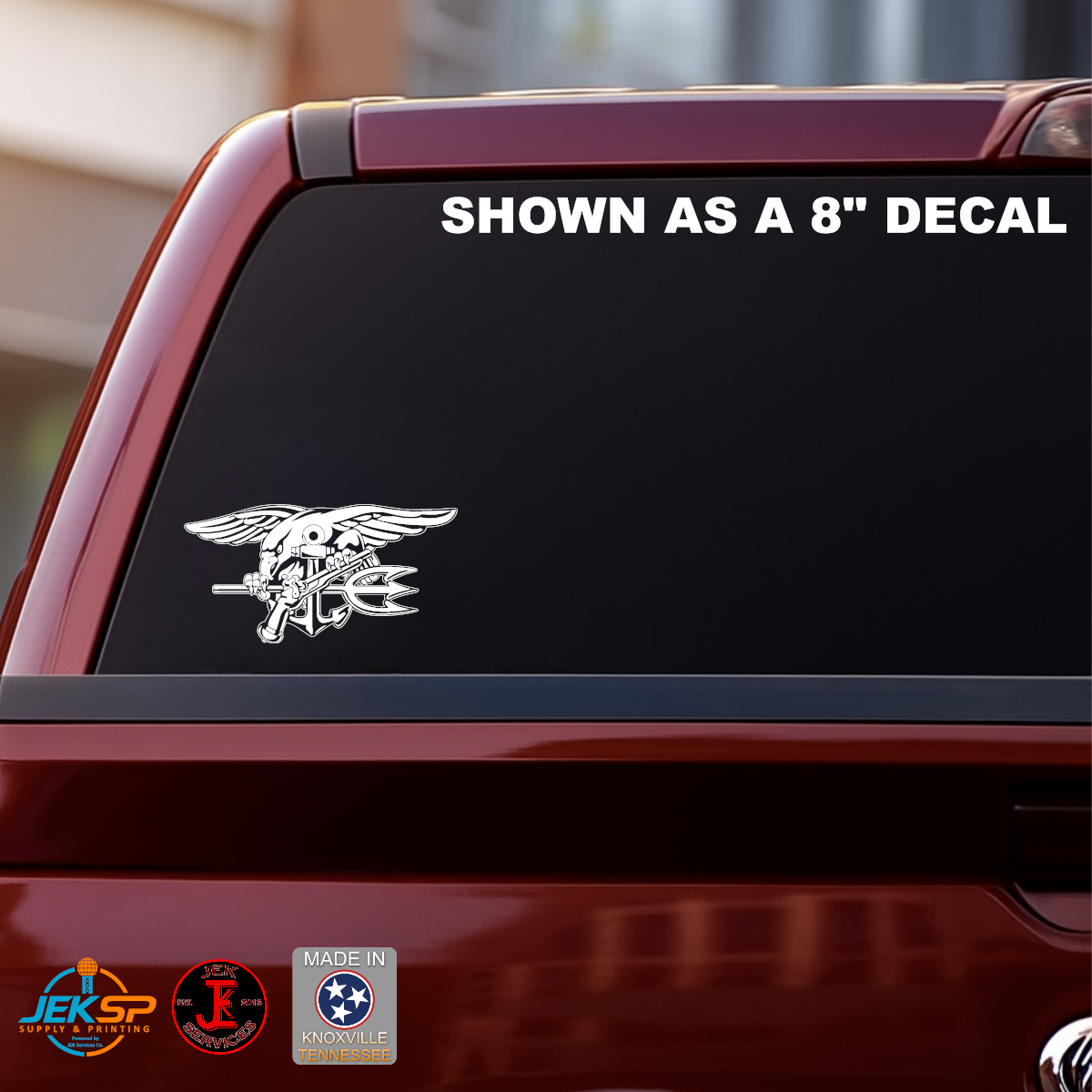 8 Inch White Navy SEAL Trident Naval Special Warfare vinyl decal displayed on the rear window of a red pickup truck.