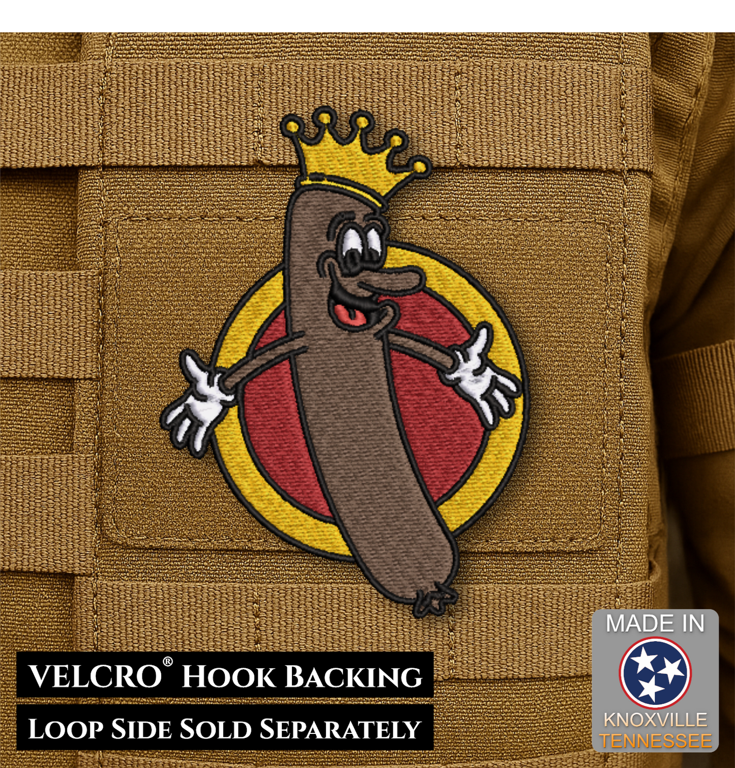 A novelty embroidered patch shaped like a sausage wearing a gold crown, displayed on a tan MOLLE tactical vest. The patch features a red and yellow circular background.