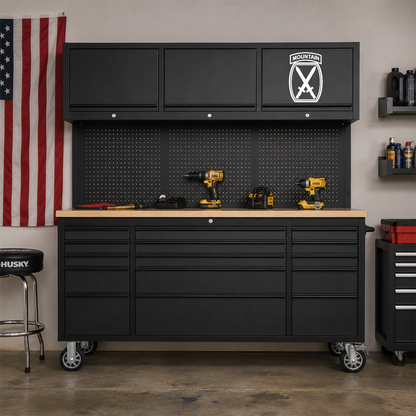 Army 10th Mountain patch vinyl decal on a black tool box in a garage.