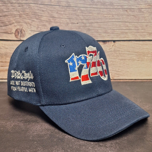 Blue cap with '1776' design on a wooden surface