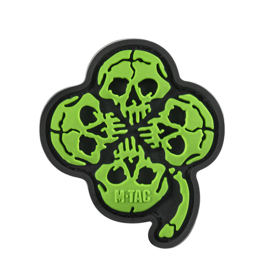 M-Tac Lucky Skull Shamrock PVC morale patch featuring four green skulls forming a clover with hook and loop backing.