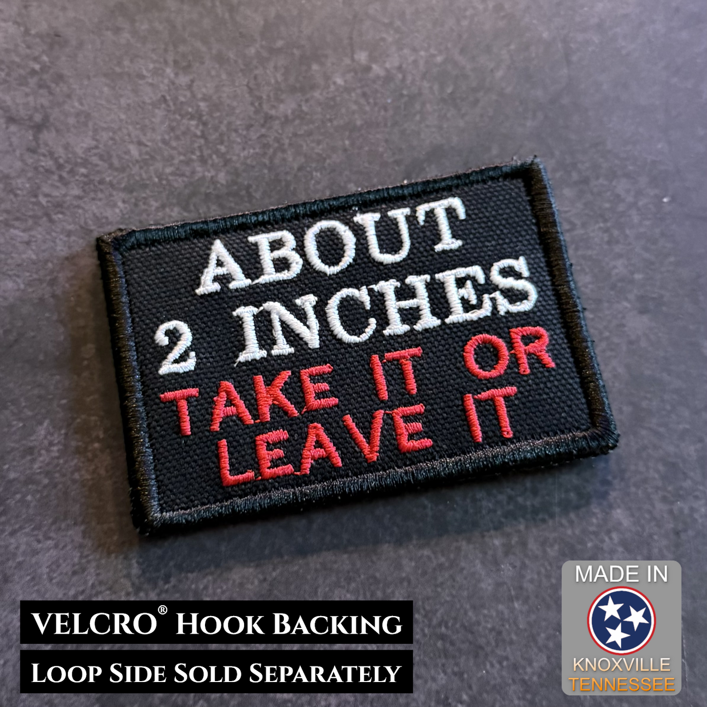Black embroidered About 2 Inches Take It or Leave It funny morale patch with white and red lettering