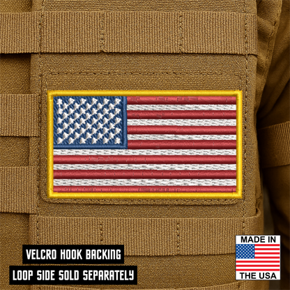 American Flag embroidered tactical morale patch with gold border and hook backing attached to tactical vest