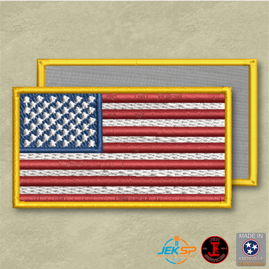 American flag patch with yellow border on a beige background