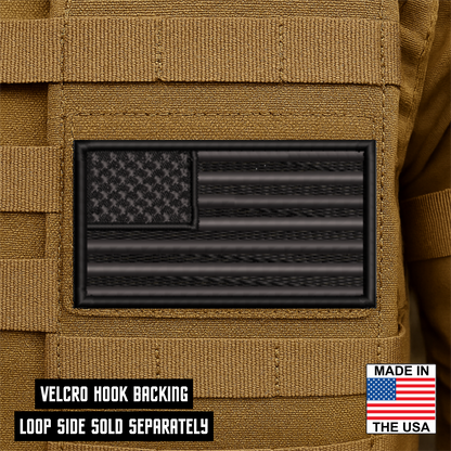 Blackout American Flag embroidered No Quarter Given tactical morale patch with hook backing attached to tactical vest
