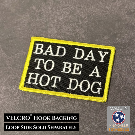 Embroidered patch with 'Bad Day to be a Hot Dog' text on a gray background