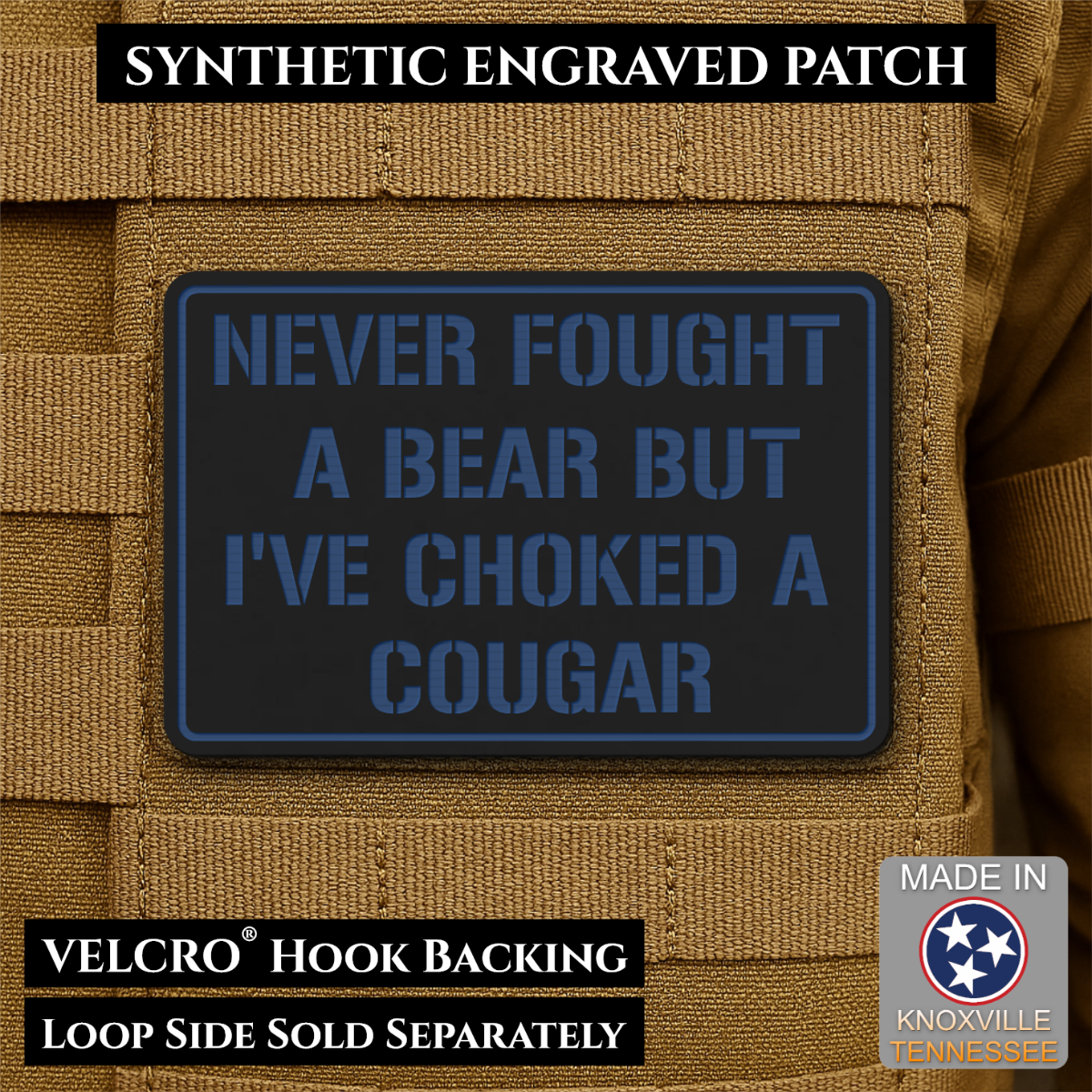 I’ve Choked A Cougar laser-engraved synthetic morale patch: a rectangular synthetic engraved patch with a dark charcoal background and blue border and lettering, shown attached to tan tactical vest loops. Text overlays read.