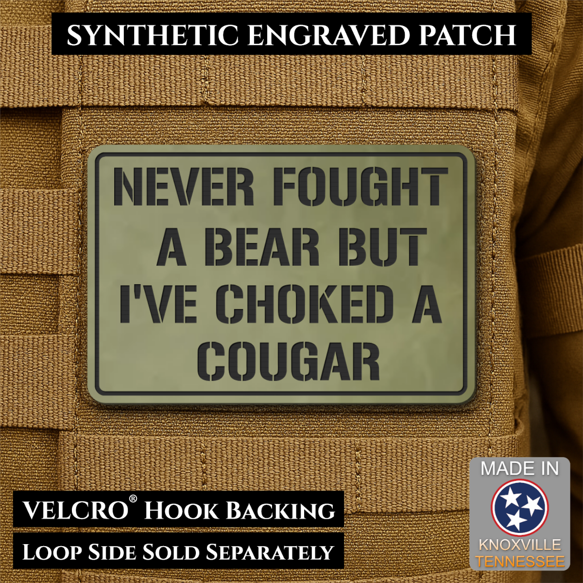 I’ve Choked A Cougar laser-engraved synthetic morale patch: a rectangular synthetic engraved patch with a tan border and dark olive-green face, reading “NEVER FOUGHT A BEAR BUT I’VE CHOKED A COUGAR,” shown attached to tan tactical.