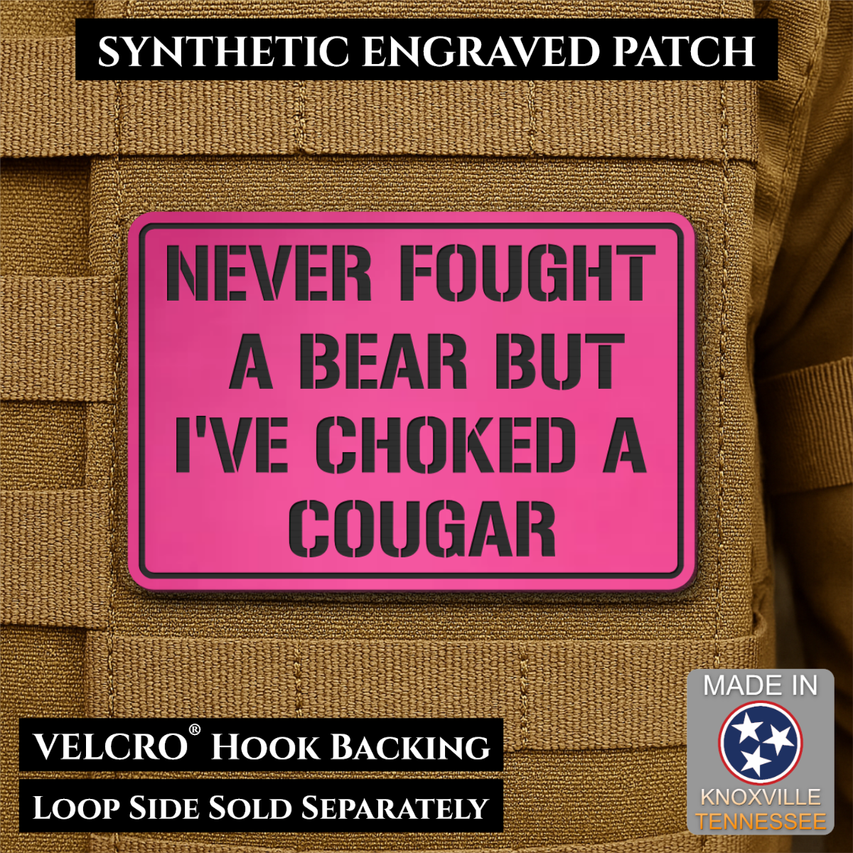 I’ve Choked A Cougar laser-engraved synthetic morale patch: a bright pink rectangular synthetic engraved patch with black text reading 'NEVER FOUGHT A BEAR BUT I'VE CHOKED A COUGAR' displayed on tan tactical fabric. Black text.