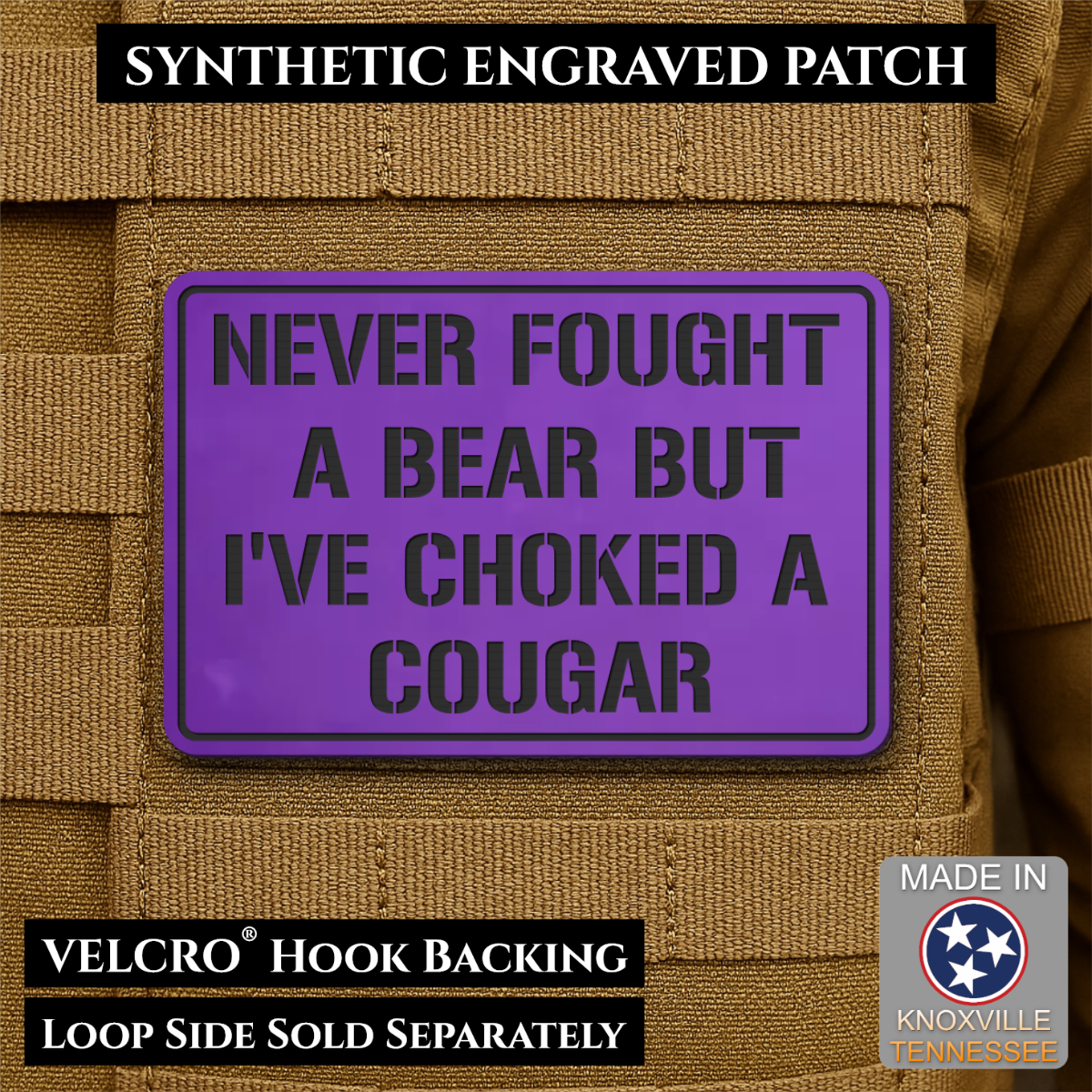 I’ve Choked A Cougar laser-engraved synthetic morale patch: a purple rectangular synthetic engraved patch with black text reading 'NEVER FOUGHT A BEAR BUT I'VE CHOKED A COUGAR,' shown attached to tan tactical vest fabric. Black.
