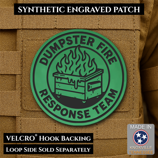 A green circular synthetic patch with black engraved text reading 'DUMPSTER FIRE RESPONSE TEAM' and a black flaming dumpster graphic, shown attached to tan MOLLE webbing. Black text banners at the top and bottom describe the product, and a small 'Made in Knoxville Tennessee' badge appears in the lower right.