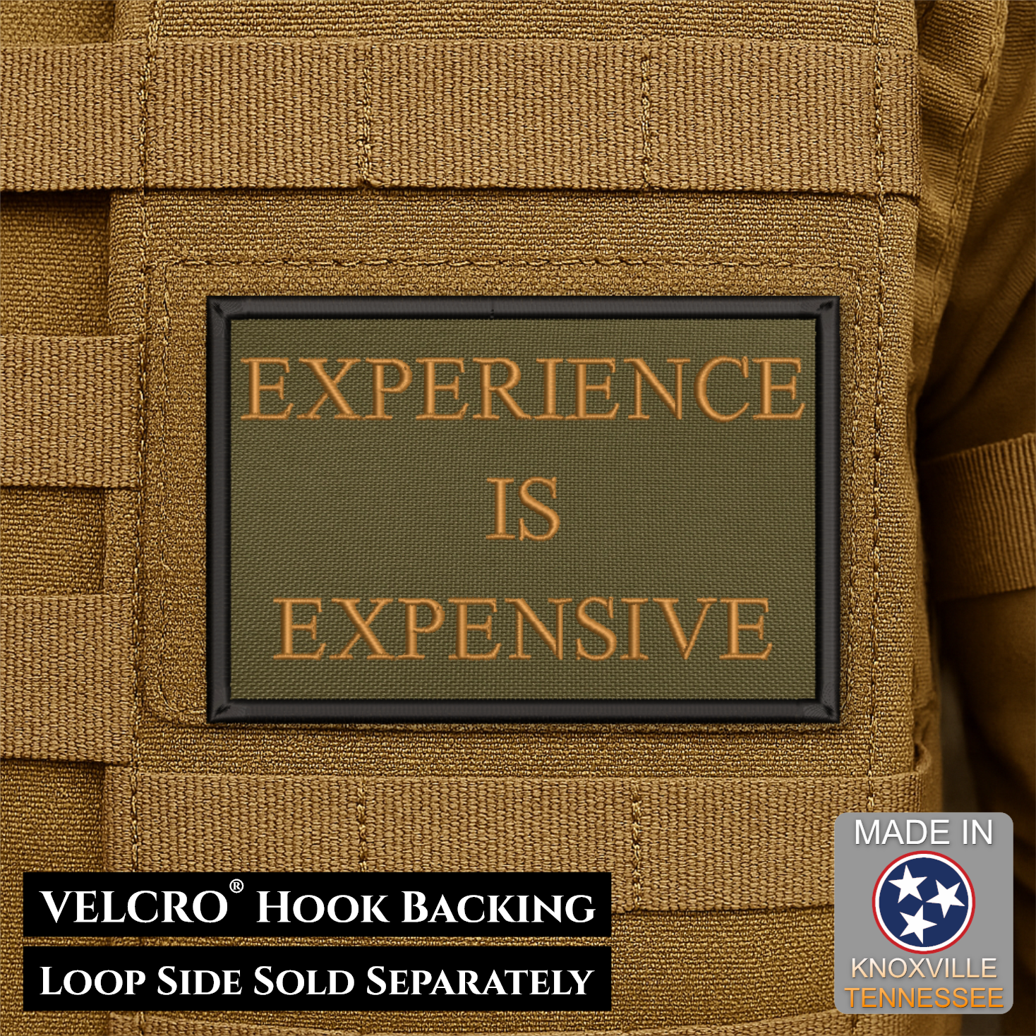 A rectangular tactical patch with the phrase 'EXPERIENCE IS EXPENSIVE' in tan lettering on an olive green background, shown attached to tan MOLLE webbing. Text at the bottom notes VELCRO hook backing and loop side sold separately, with a Made in Knoxville Tennessee badge.