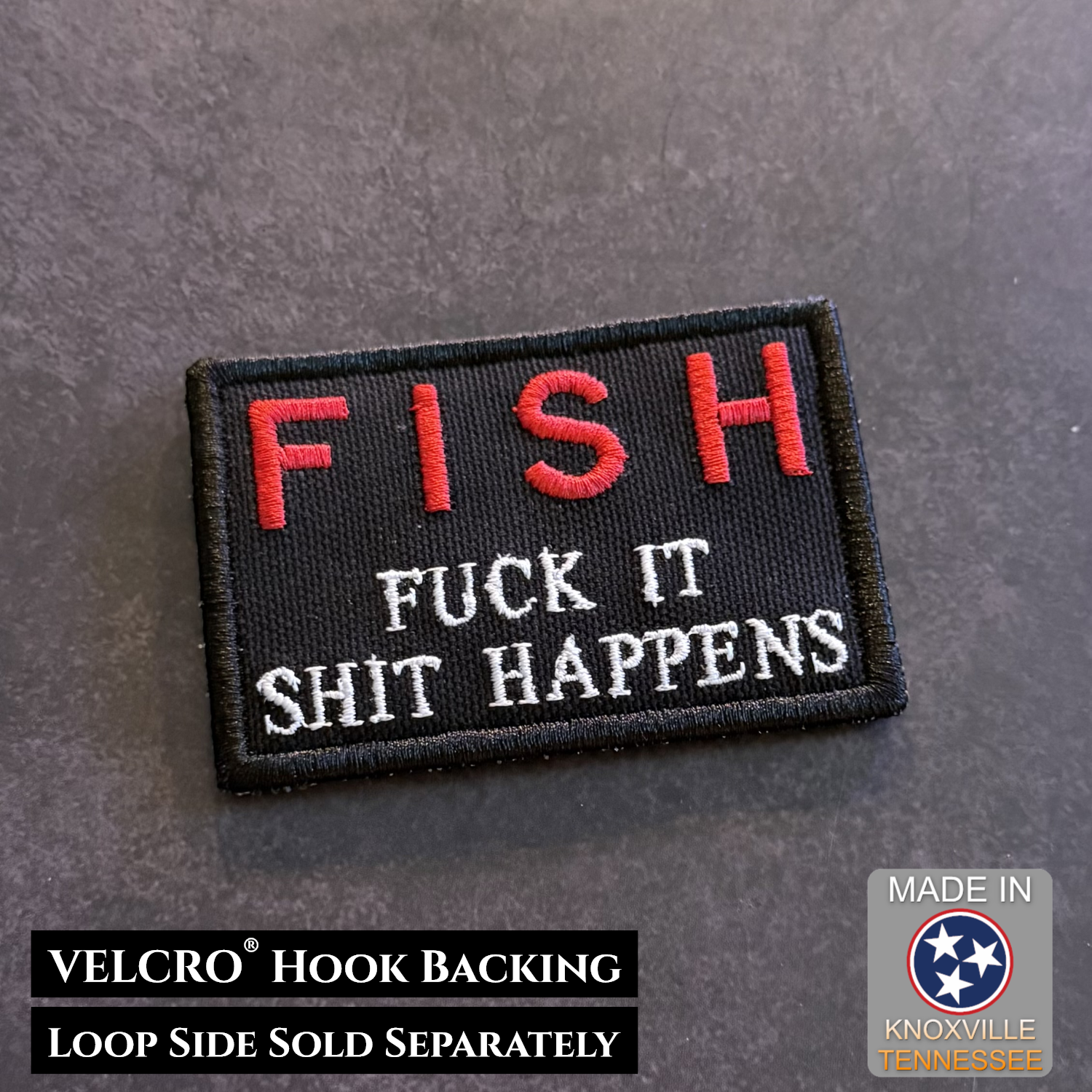 Black embroidered FISH Fuck It Shit Happens morale patch with red and white lettering and VELCRO hook backing