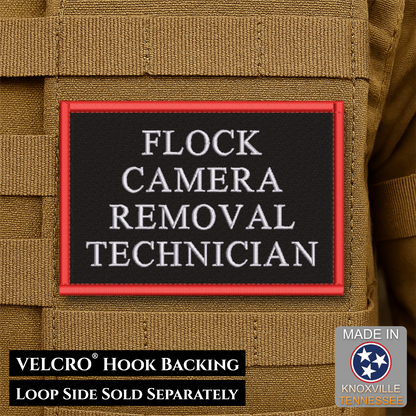 A rectangular black patch with a red border and white embroidered text reading 'FLOCK CAMERA REMOVAL TECHNICIAN,' shown attached to tan tactical webbing. Text at the bottom says 'VELCRO HOOK BACKING' and 'LOOP SIDE SOLD SEPARATELY,' with a 'MADE IN Knoxville Tennessee' badge in the lower right.