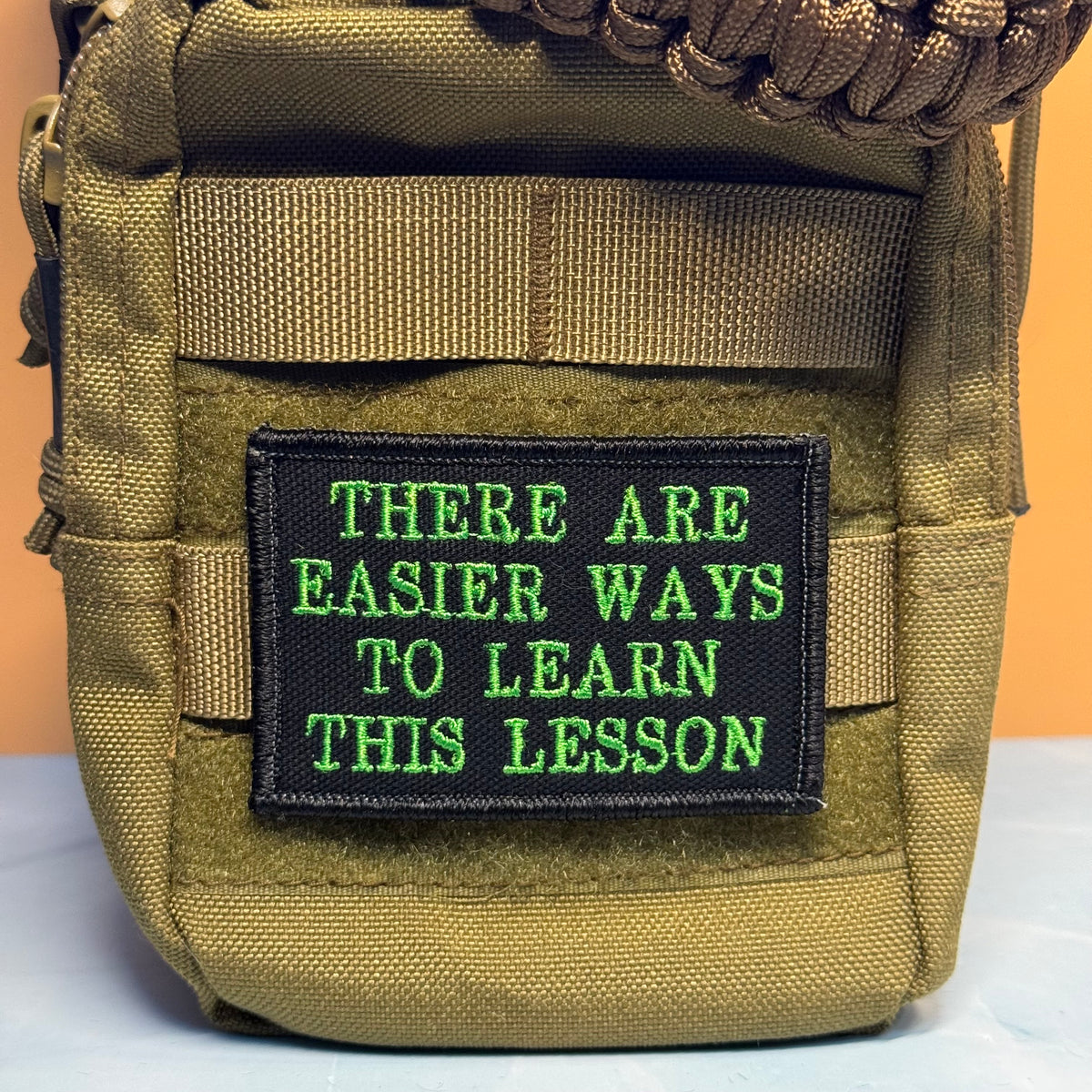 Hard Life Lessons Funny Embroidered Morale Patch, 2x3" | VELCRO® Brand Hook Backing