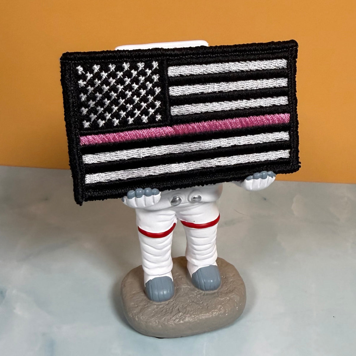 Breast Cancer Awareness Thin Pink Line American Flag embroidered morale patch, product photograph.