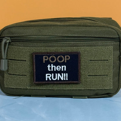 An olive green tactical pouch with a front hook-and-loop patch that reads 'POOP then RUN!!' in white and tan lettering, set against a solid orange background.