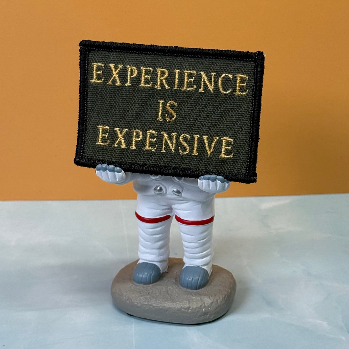 Experience Is Expensive Funny Tactical embroidered morale patch, product photograph.