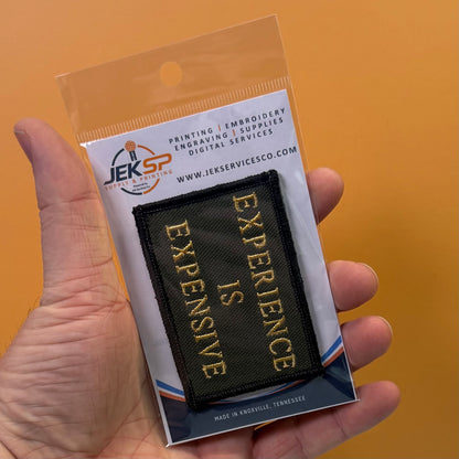 Experience Is Expensive Funny Tactical embroidered morale patch, product photograph.