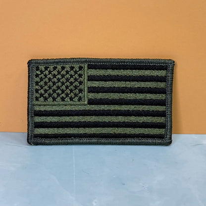 Olive OD Green Tactical American Flag embroidered morale patch, product photograph.