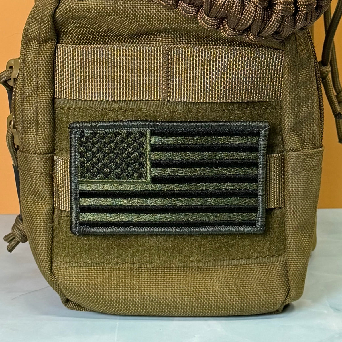 Olive OD Green Tactical American Flag embroidered morale patch, product photograph.