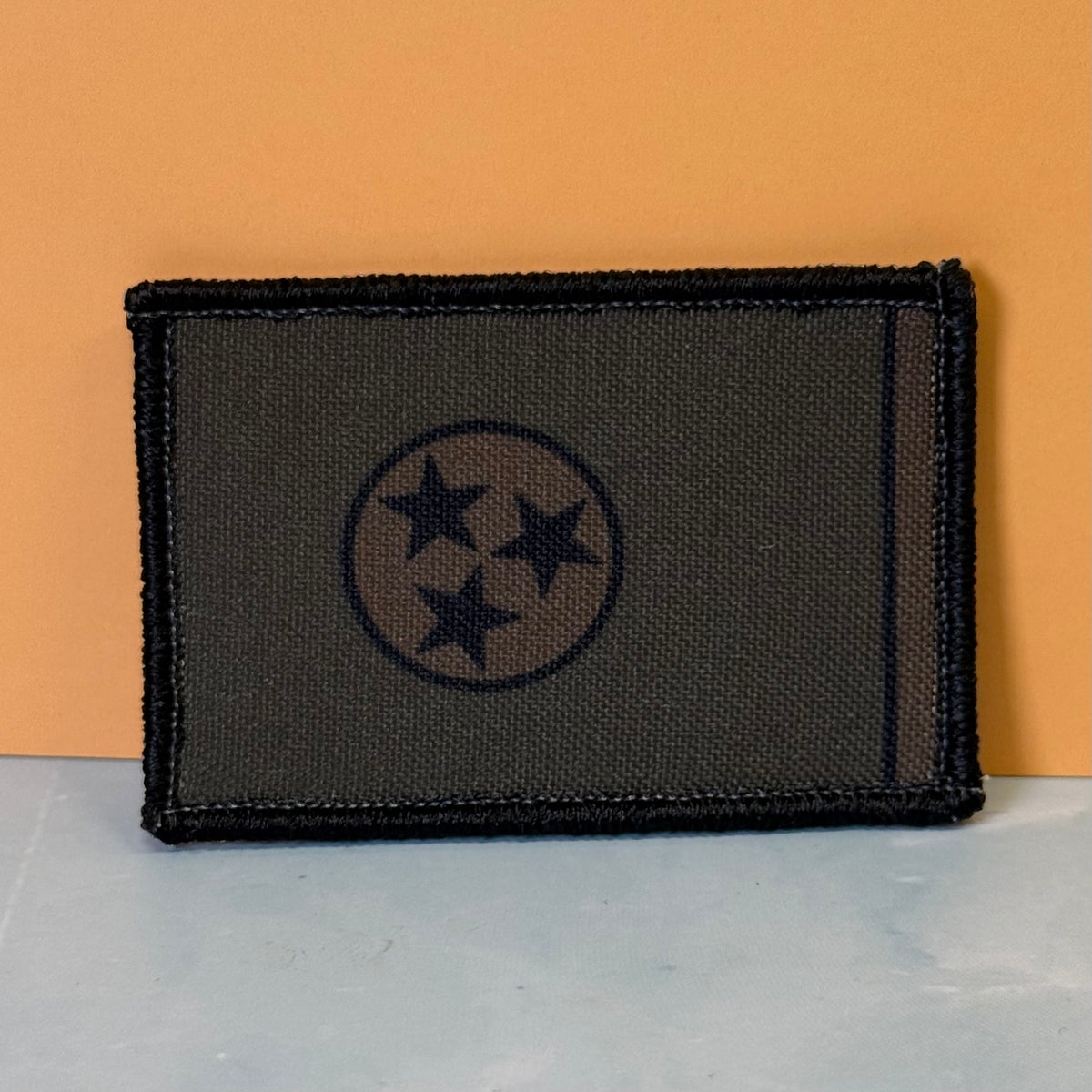 Tennessee State Flag printed canvas morale patch featuring the Tennessee state flag design with three stars inside a circle, set against a solid orange background.