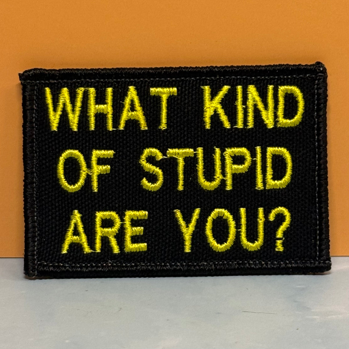 What Kind of Stupid Are You Funny embroidered morale patch, product photograph.