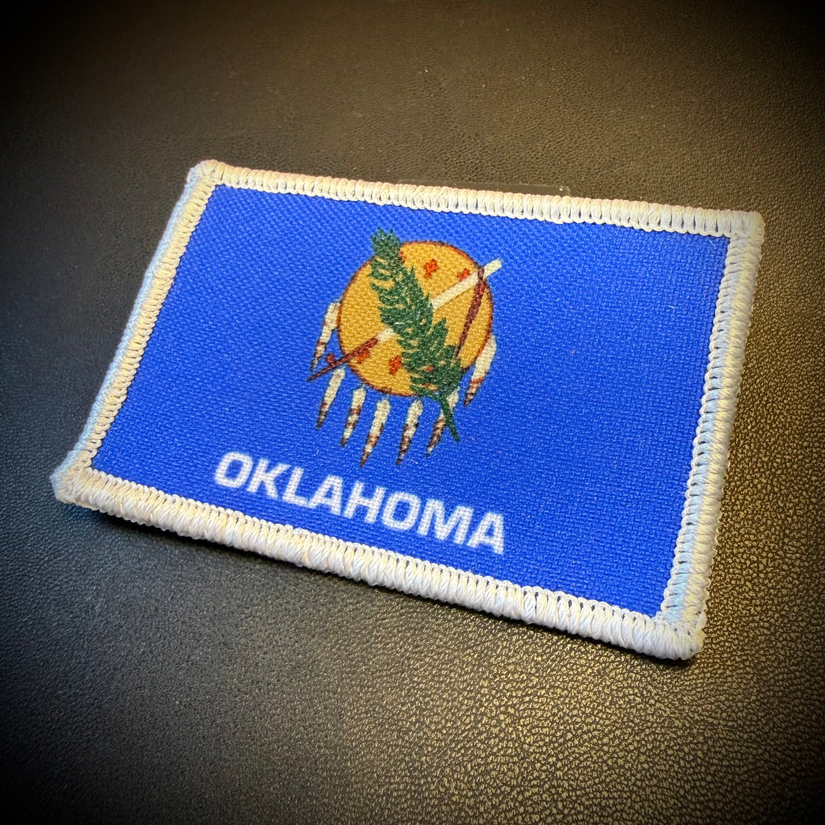 Oklahoma state flag hook-backed morale patch, alternate view of the printed flag design