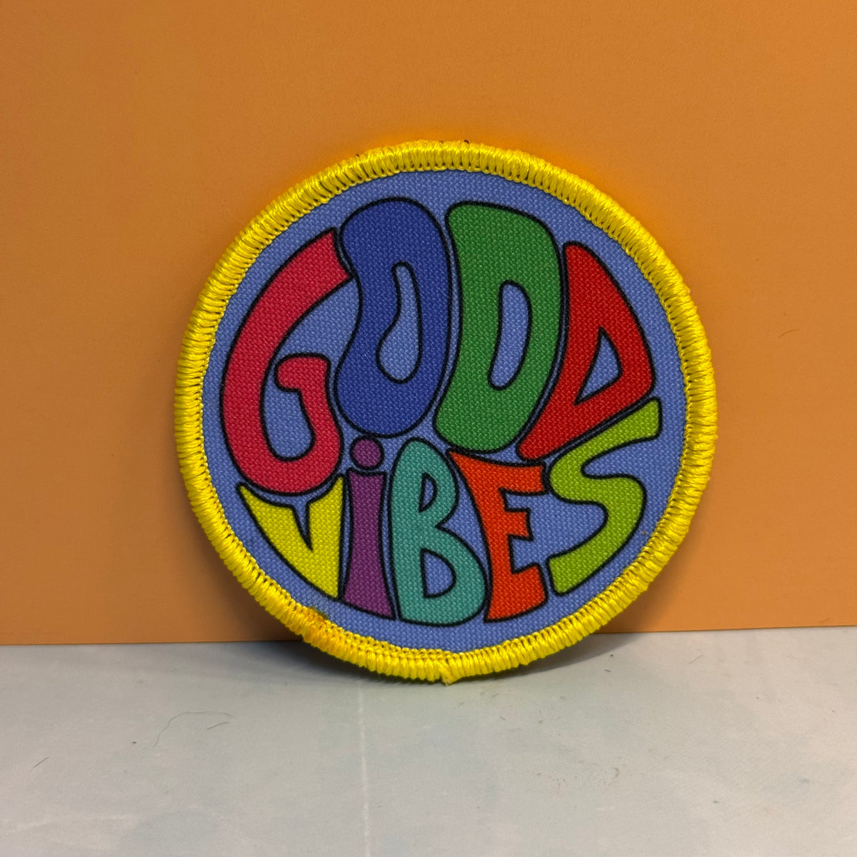 Retro Good Vibes Only round patch with VELCRO Brand hook backing, product photograph