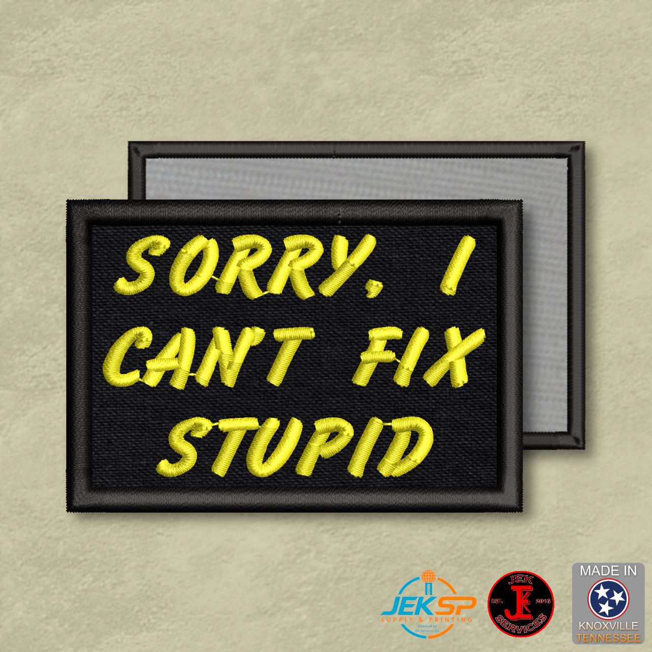 Black embroidered "Sorry, I Can't Fix Stupid" morale patch with bright yellow lettering, genuine VELCRO® hook backing, made in Tennessee.