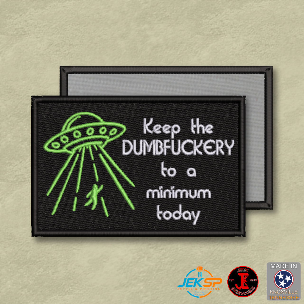 Funny embroidered morale patch with UFO design reading "Keep the Dumbfuckery to a Minimum Today" featuring genuine VELCRO® hook backing. Made in Tennessee.