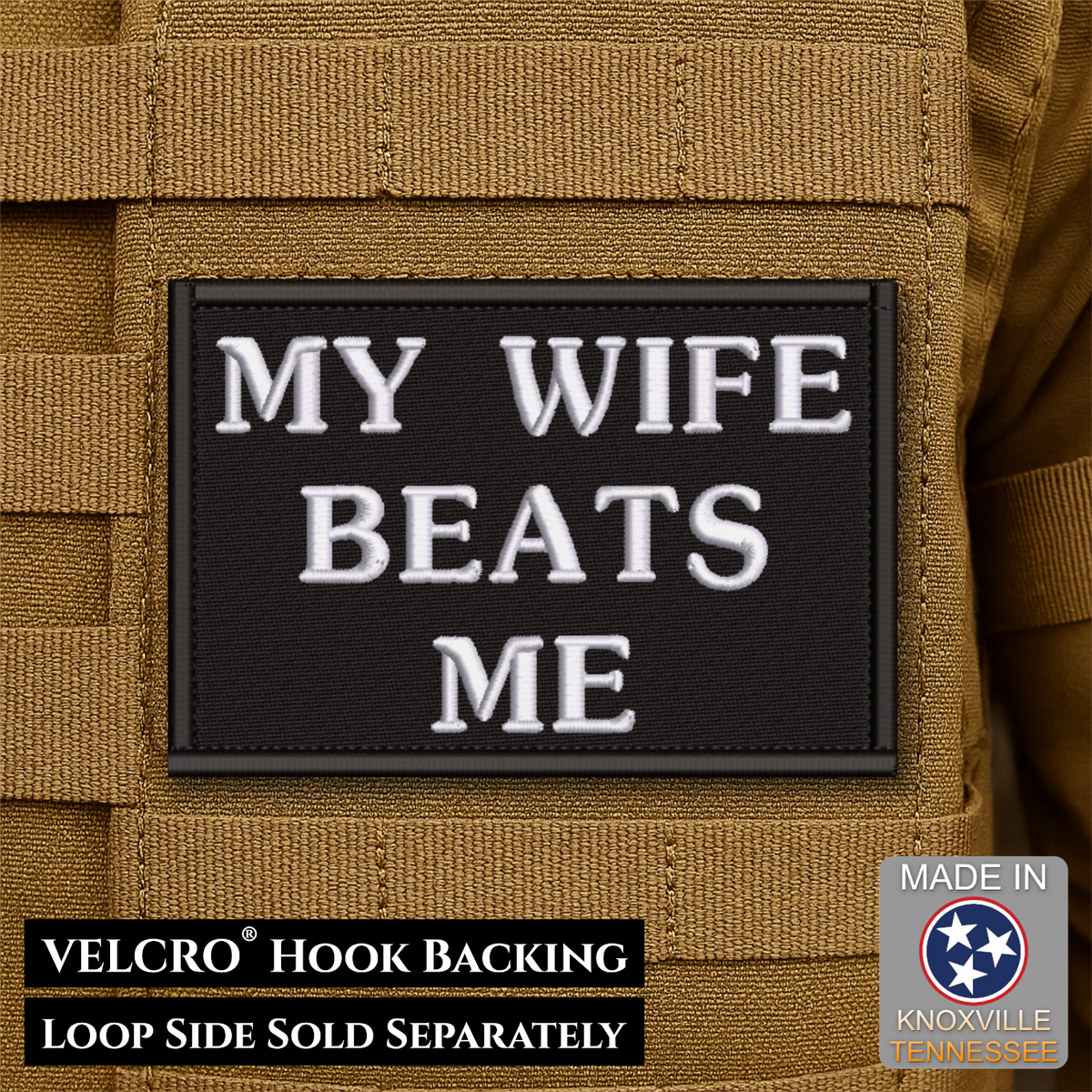 A rectangular black Velcro patch with white embroidered text reading “MY WIFE BEATS ME,” shown attached to tan tactical gear. Text at the bottom notes VELCRO hook backing and loop side sold separately; a “Made in Knoxville Tennessee” badge appears in the lower right.