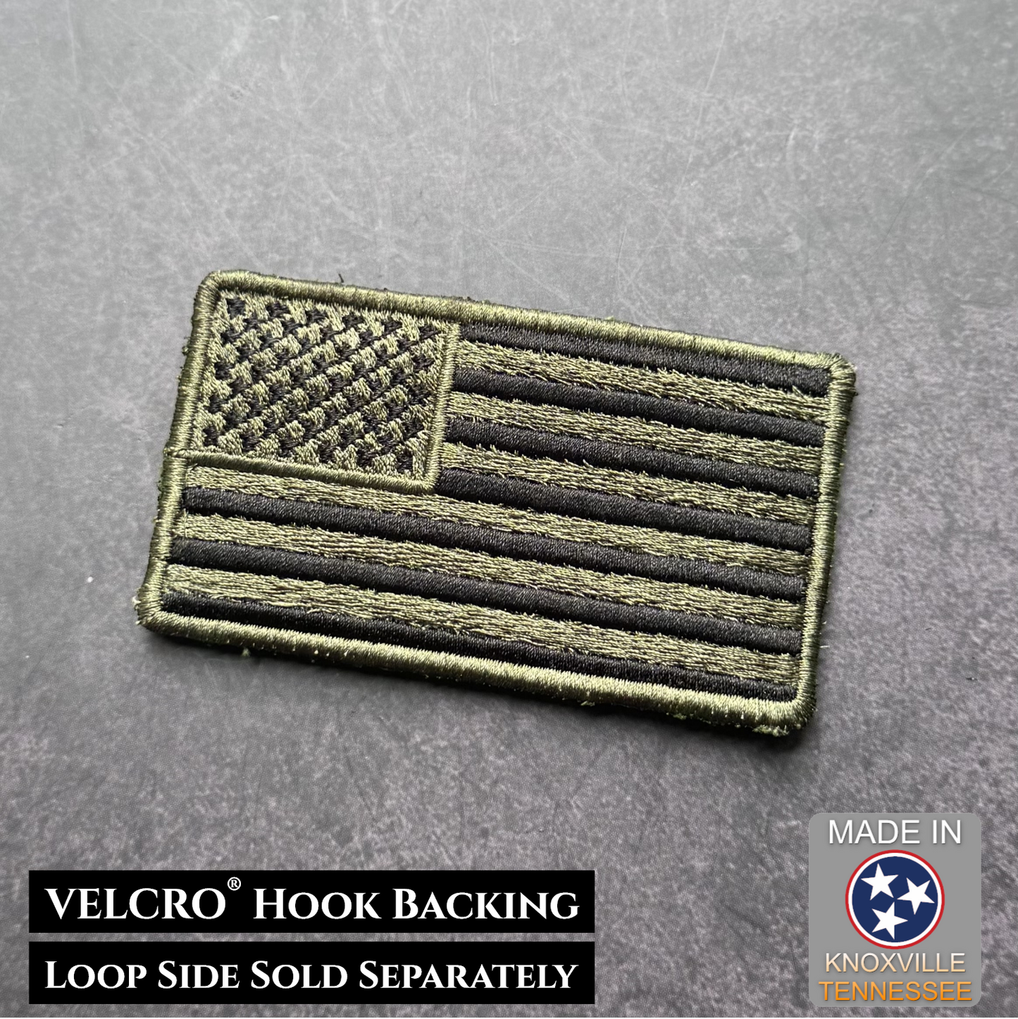 Tactical patch with American flag design on a gray background, featuring VELCRO hook backing.