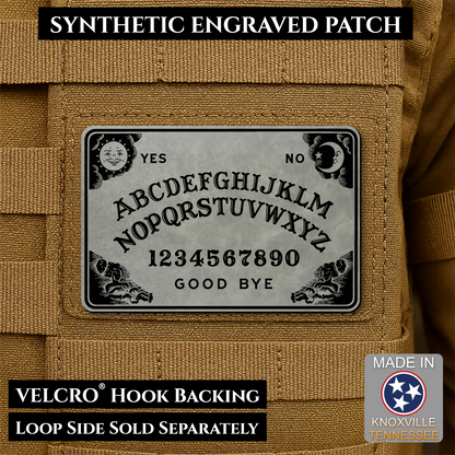 Gray laser engraved Ouija Board morale patch with vintage spirit board artwork and celestial accents