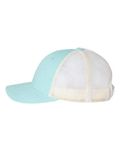 Two baseball caps, one light blue and one white, on a white background