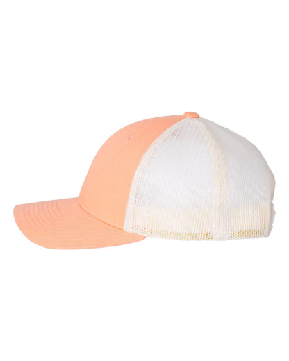 Two-tone peach and white cap on a white background