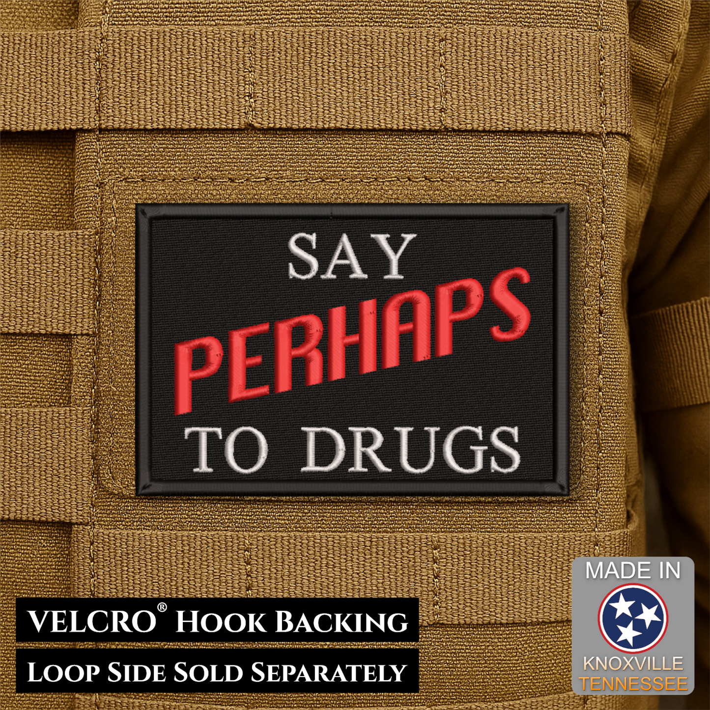 A rectangular black Velcro patch with the phrase “SAY PERHAPS TO DRUGS” in white and red embroidered lettering, shown attached to tan tactical fabric. Text at the bottom notes VELCRO™ Hook Backing and Loop Side Sold Separately; a “Made in Knoxville Tennessee” badge appears in the lower right.