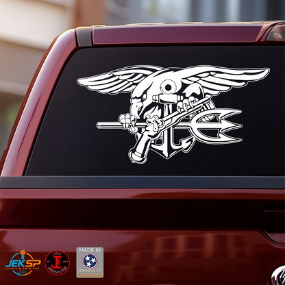 White Navy SEAL Trident Naval Special Warfare vinyl decal displayed on the rear window of a red pickup truck.