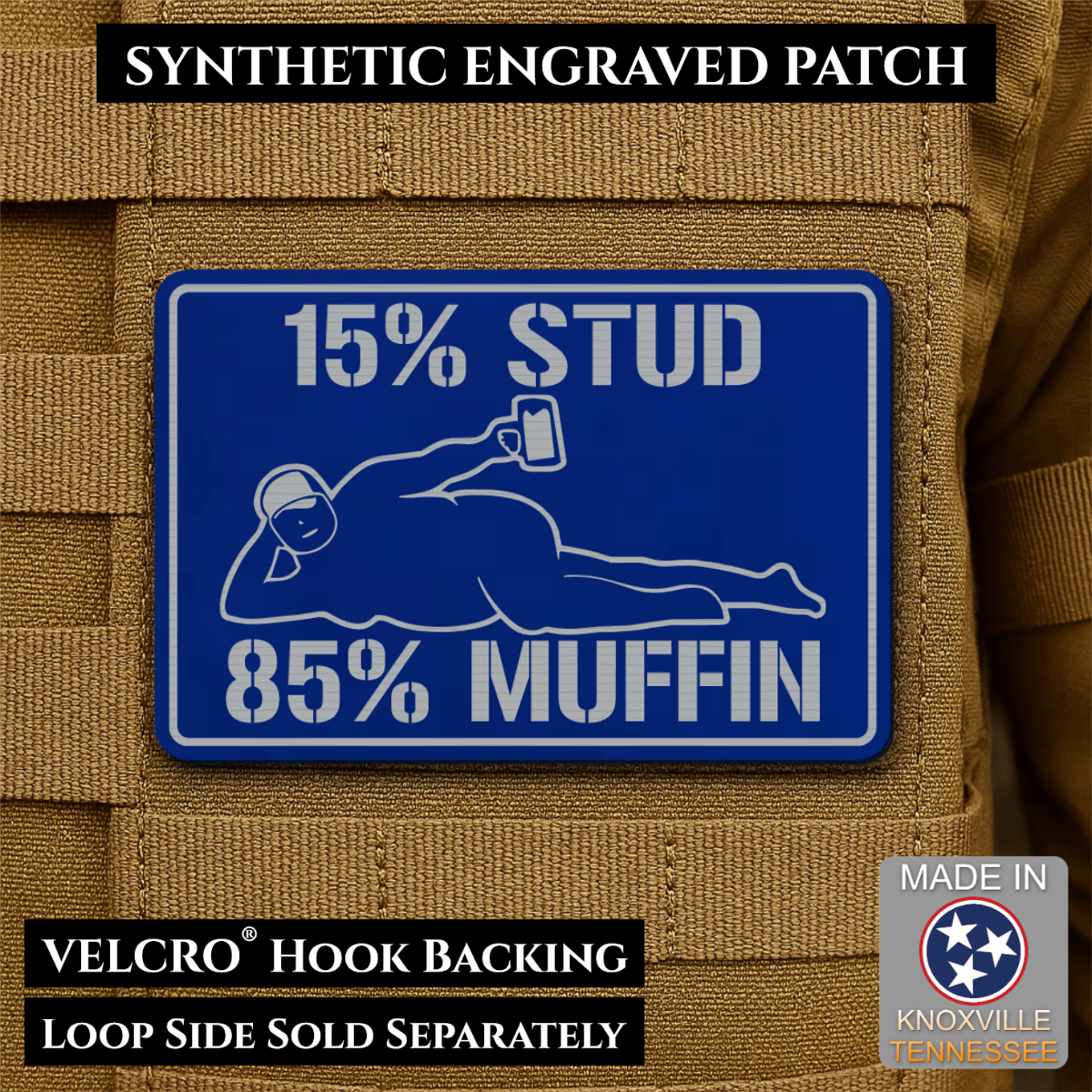 15% Stud 85% Muffin Funny Dad Bod laser-engraved synthetic morale patch: a rectangular blue synthetic patch with white engraved text reading “15% STUD 85% MUFFIN” and a white line drawing of a person lying down holding a phone.