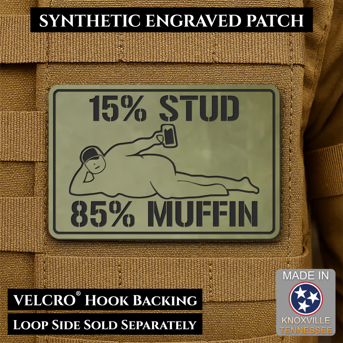 15% Stud 85% Muffin Funny Dad Bod laser-engraved synthetic morale patch: a rectangular synthetic engraved patch mounted on tan tactical vest loops. The patch is olive drab green with black text reading '15% STUD 85% MUFFIN' and a.