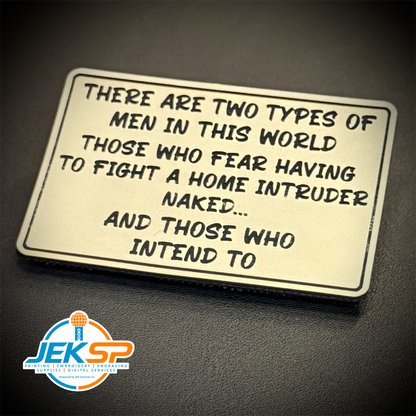 2 Types of Men In This World laser-engraved synthetic patch: a rectangular metal sign with rounded corners featuring a humorous quote about men, displayed on a dark textured surface. A logo for 'JEKSP Custom Engraving.