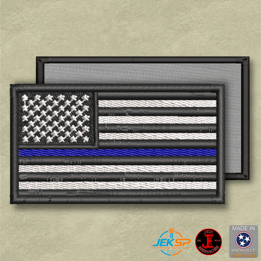 American flag patch with blue stripe on a beige background