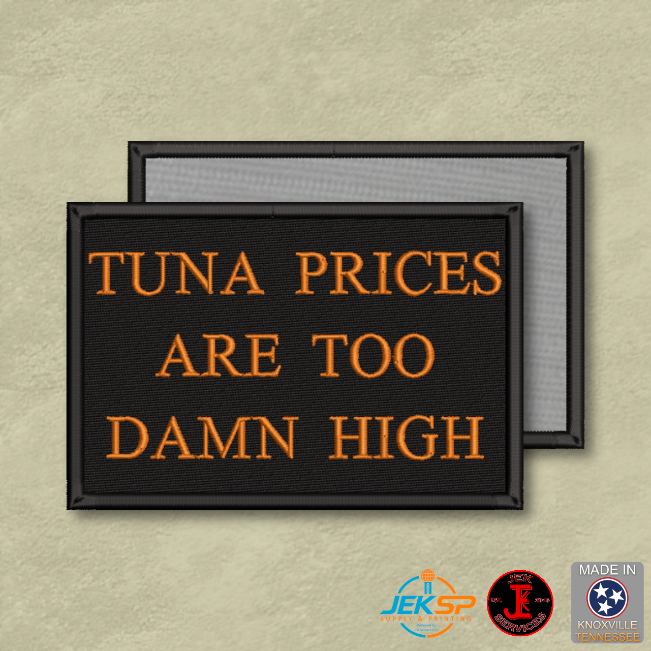 Tuna Prices Are Too Damn High funny embroidered morale patch with orange lettering on a black background and Velcro® hook backing.