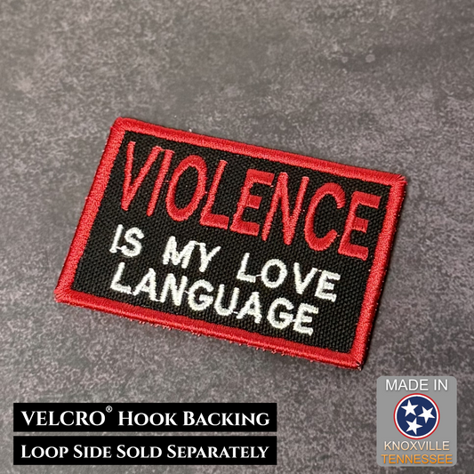Patch with 'Violence is my love language' text on a gray background