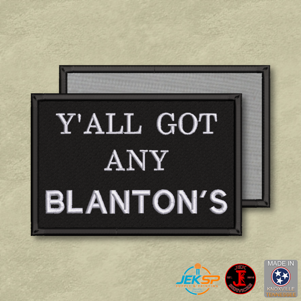 Blanton's funny embroidered morale patch with white and green lettering on a black background and Velcro® hook backing.